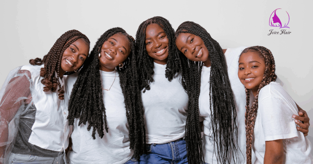 Black African natural hair styles featuring five women smiling with beautiful twists and braids.