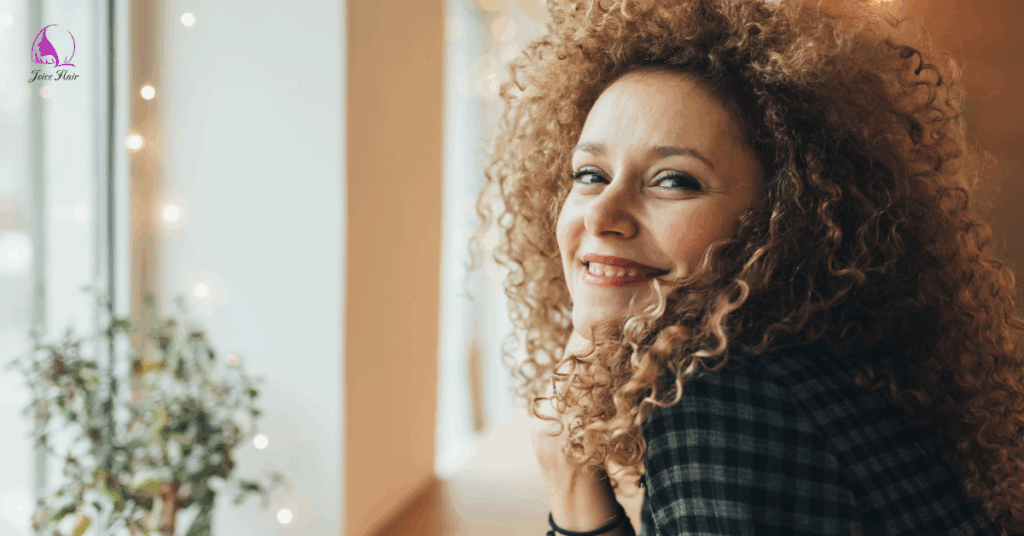 Beautiful curly hair women sitting in the cafe.