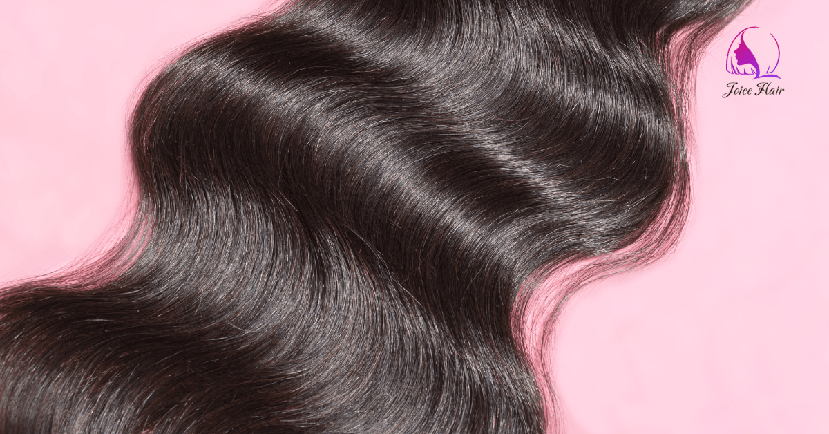 Close-up of shiny, wavy Raw Cambodian hair bundle displayed on a pink background with the Joice Hair logo in the top right corner.